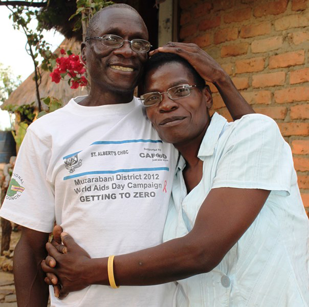 Photo of Zimbabwean woman Rosa Sande and her husband Samuel Mateo. Rosa visited the  St. Albert's cervical cancer prevention clinic for screening. Serious precancerous changes were found. A St. Albert's surgeon performed a  hysterectomy that prevented the cancer. Rosa encourages other women to  be screened, especially those in remote areas. “It can save a woman’s  life,” she says.