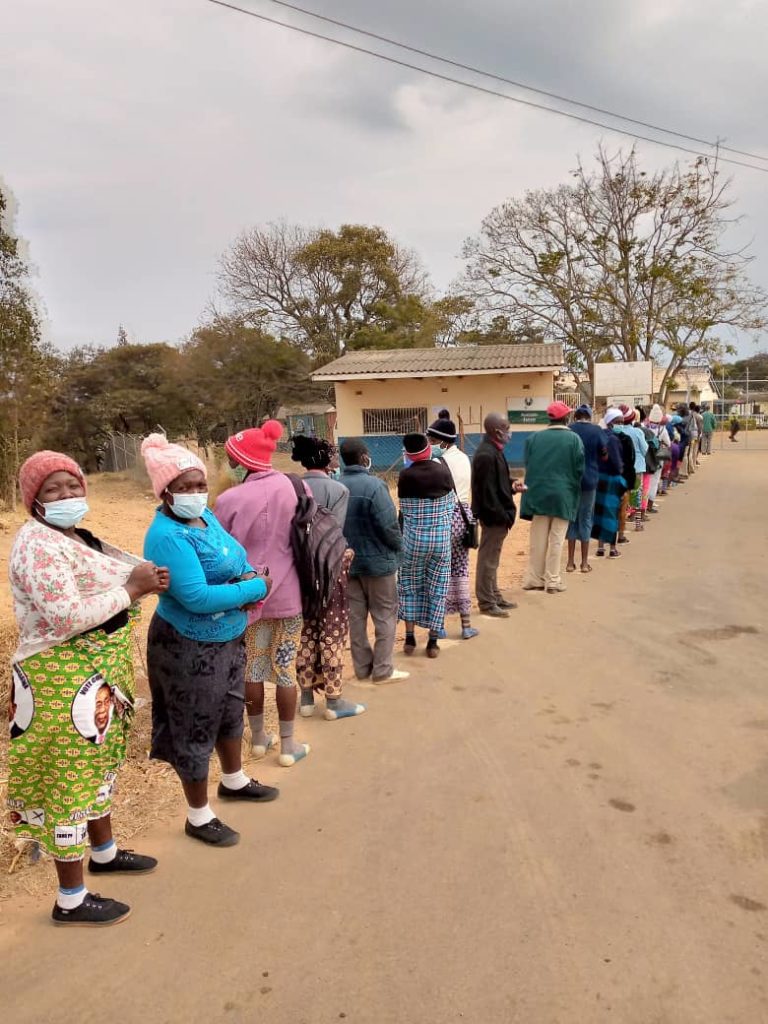 Photo showing line of local people waiting to be vaccinated for COVID-19 at St. Albert's Mission Hospital, 23 August 2021