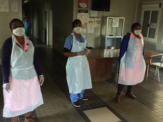 Photo of nurses at St. Albert's Mission Hospital wearing gowns and masks purchased using a $1,000 donation made by a BHA board member to help the hospital provide personal protective equipment to staff.